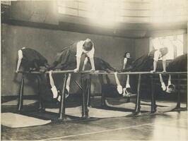 Students on parallel bars