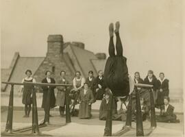 Student standing on head