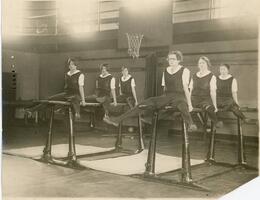 Students on parallel bars