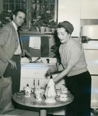 The Lunts at home, 150 East End Avenue : Lynn Fontanne and unidentified man in kitchen