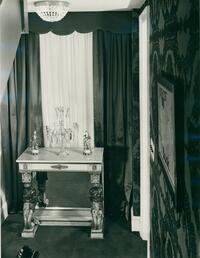 The Lunts at home, 150 East End Avenue : table with candelabra and ceramic figurines