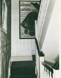 The Lunts at home, 150 East End Avenue : stairwell with Toulouse-Lautrec poster