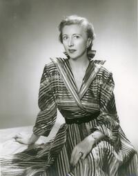 Publicity portrait of unidentified woman in striped dress