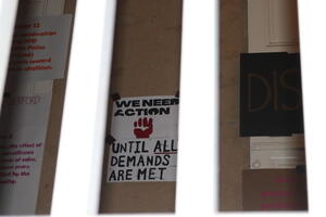 Poster On Founders Hall Demanding Action 1