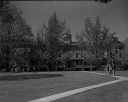 Students walking on the path away from Founders Hall