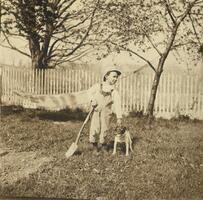 Little boy, dog, hammock