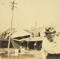 Sarah P. Underhill in front of destroyed boardwalk