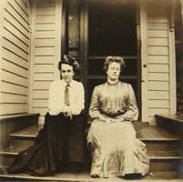 Two young women on porch