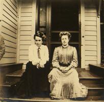 Two young women on porch