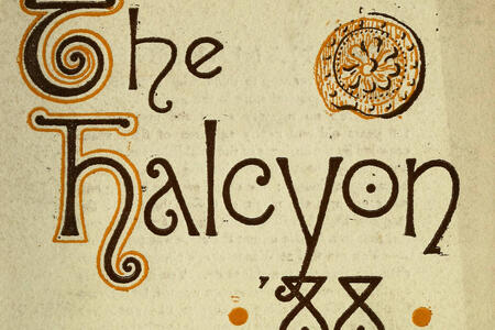 Front cover of The Halcyon consisting of "The Halcyon" in a stylized font, a seal, and two symbols