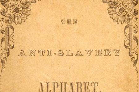 Close up of the decorated inside cover of a book titled "The Anti-Slavery Alphabet"