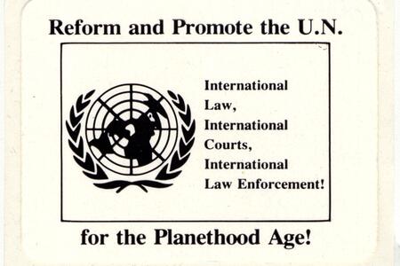 Stamp with the U.N. logo and the title "Reform and Promote the U.N. for the Planethood Age!"