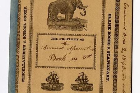 Stationery with engravings of boats and an elephant with the text "The Property of the Annual Association Book no 5th"